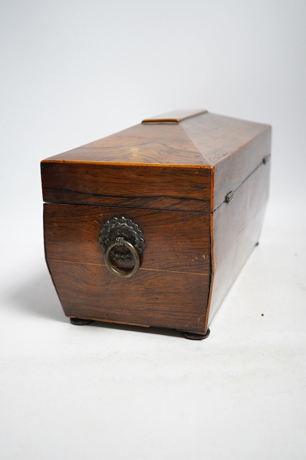 A Regency rosewood tea caddy, three pairs of nut crackers including a novelty skull nut cracker, a plated bowl, two napkin rings and a Wedgwood dish. Condition - varies